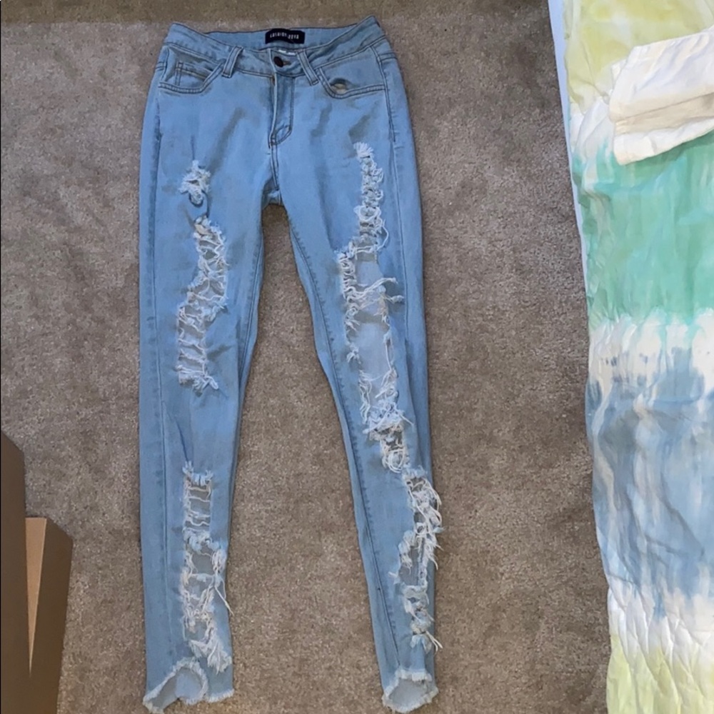 Fashion Nova blue ripped jeans